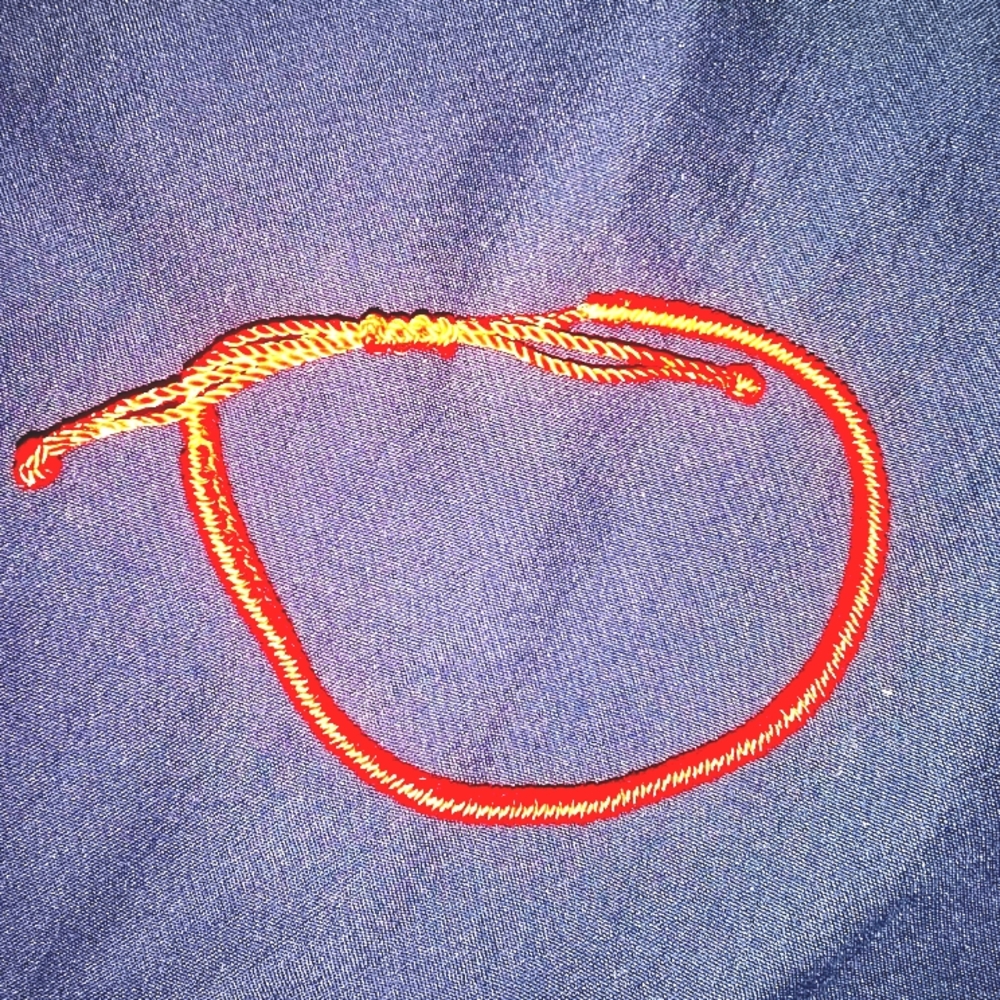 Handmade red woven bracelet